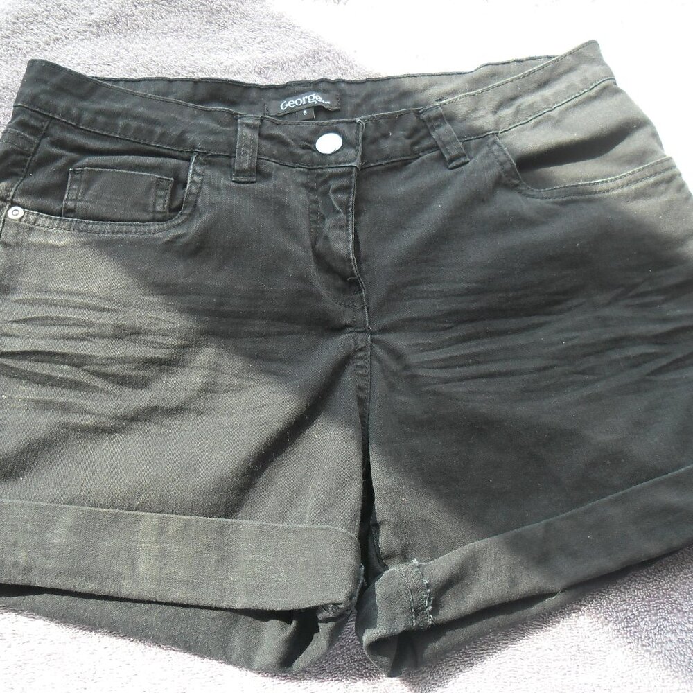 Black cotton shorts by "George". Size 6.
